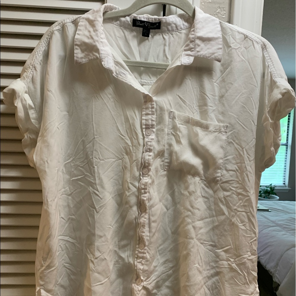 Thin white short sleeved button down.